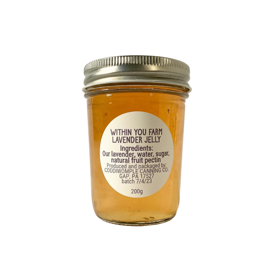 Within You Farm lavender jelly in an 8oz jar, a sweet floral condiment perfect for breakfast or charcuterie boards.