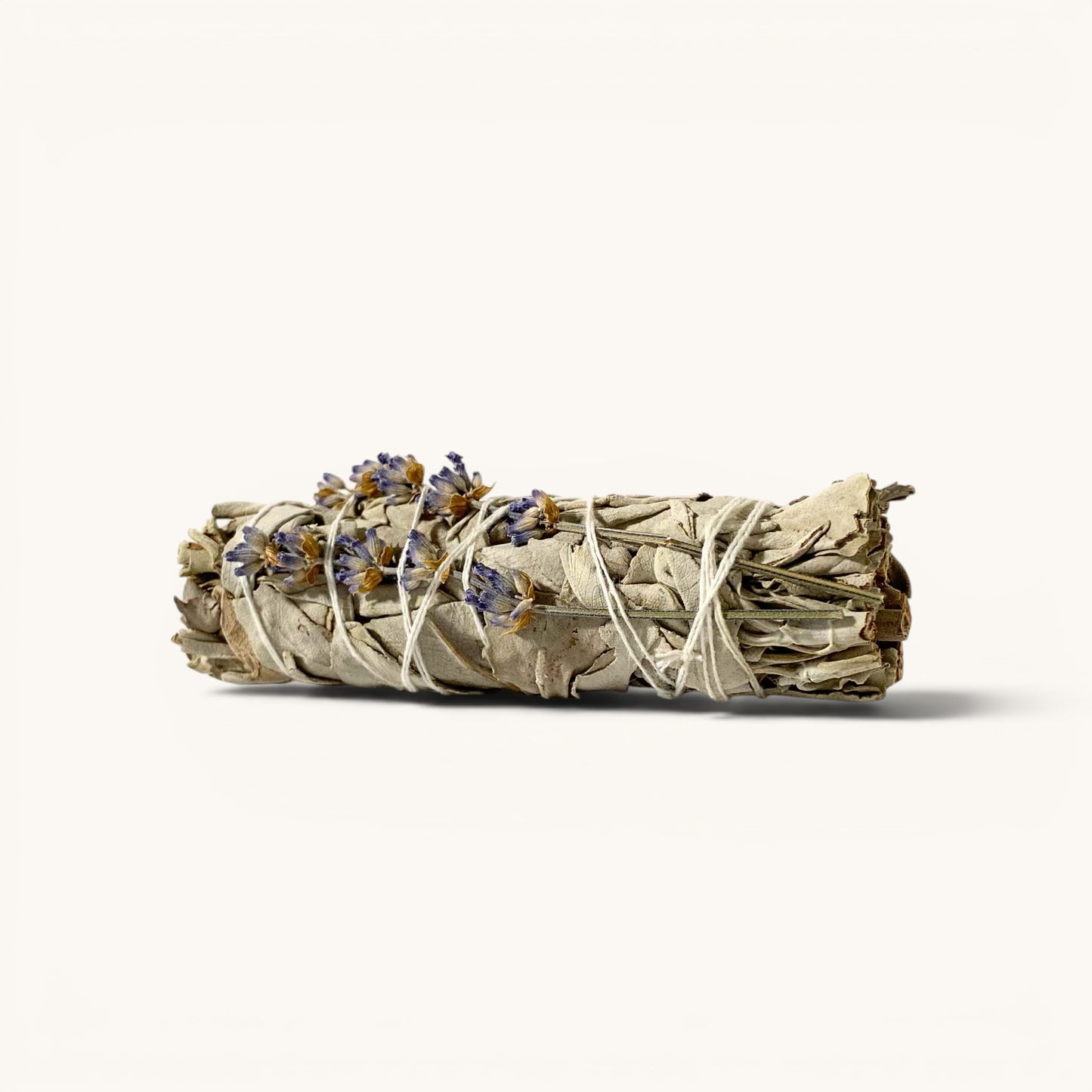 White sage smudge stick wrapped with Within You Farm lavender