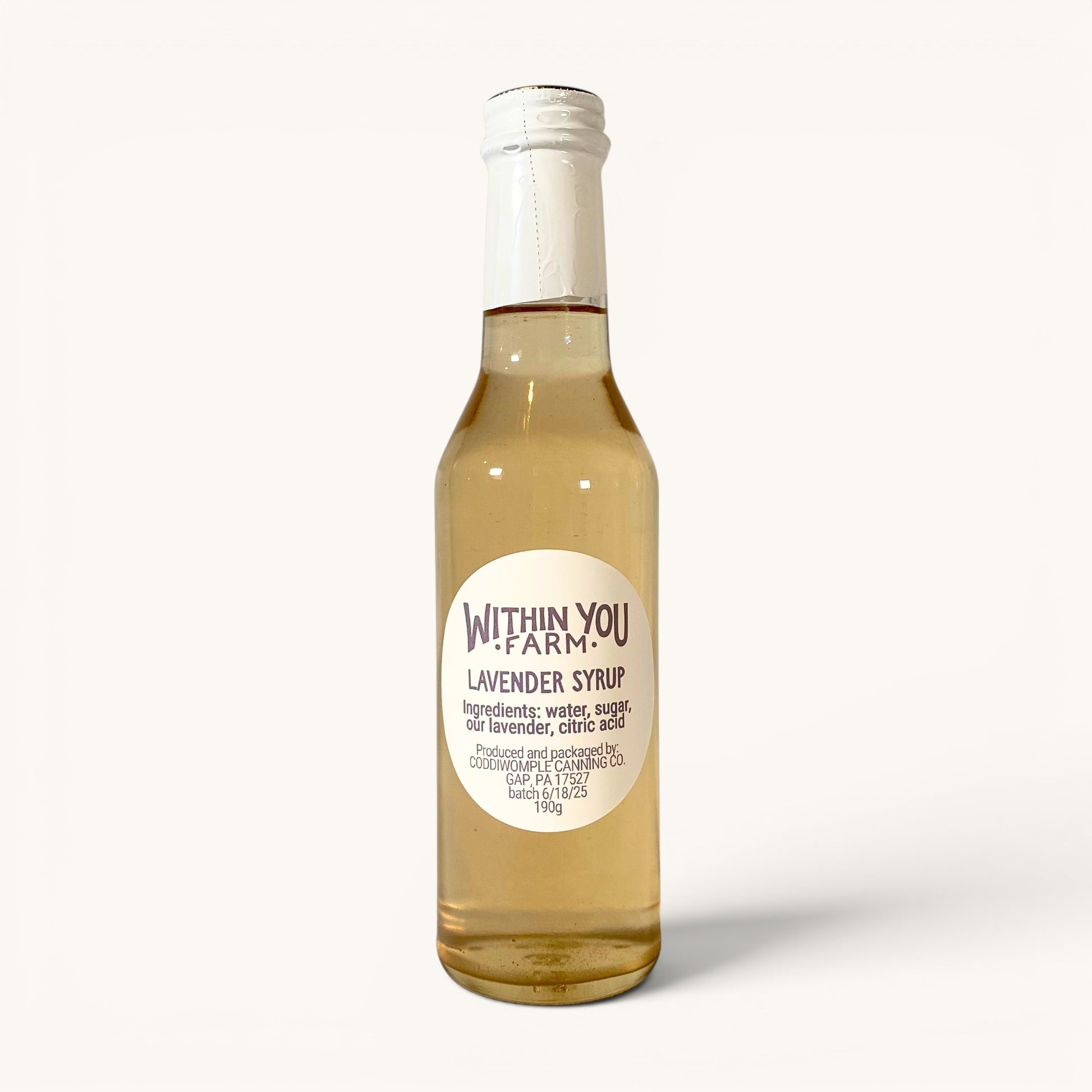 Within You Farm lavender simple syrup in a glass jar
